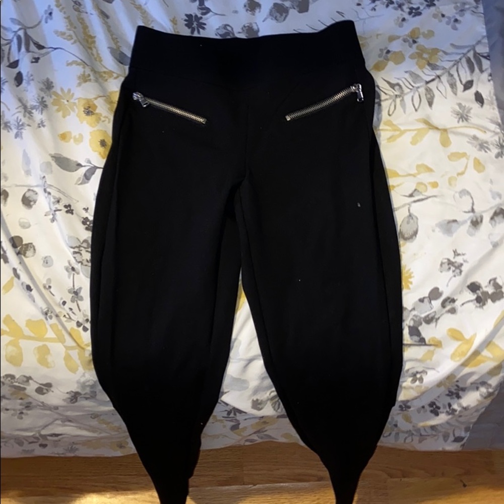 A pair of black jeggings.
